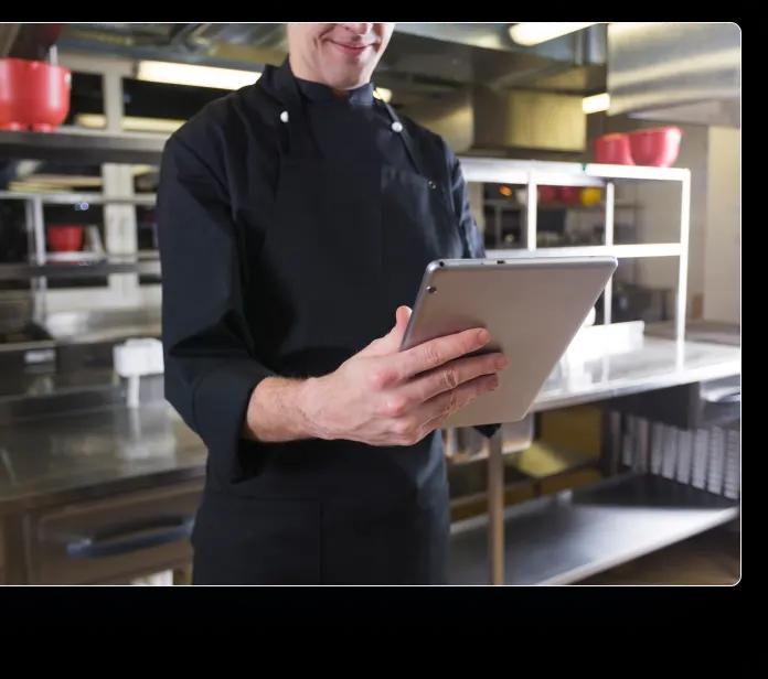 a chef using a tablet