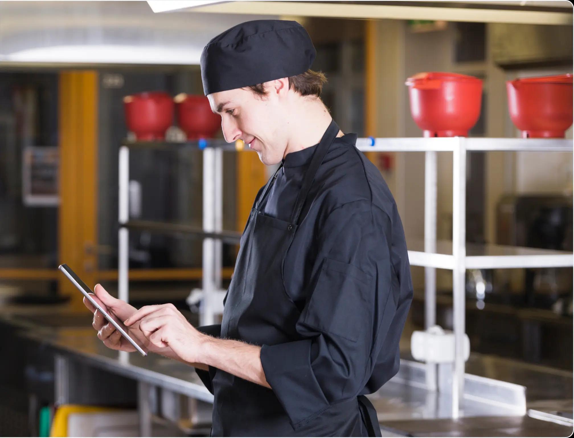 a chef using a tablet