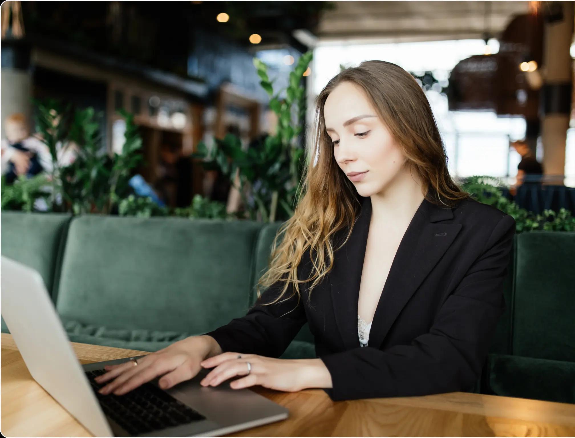 a woman using a computer