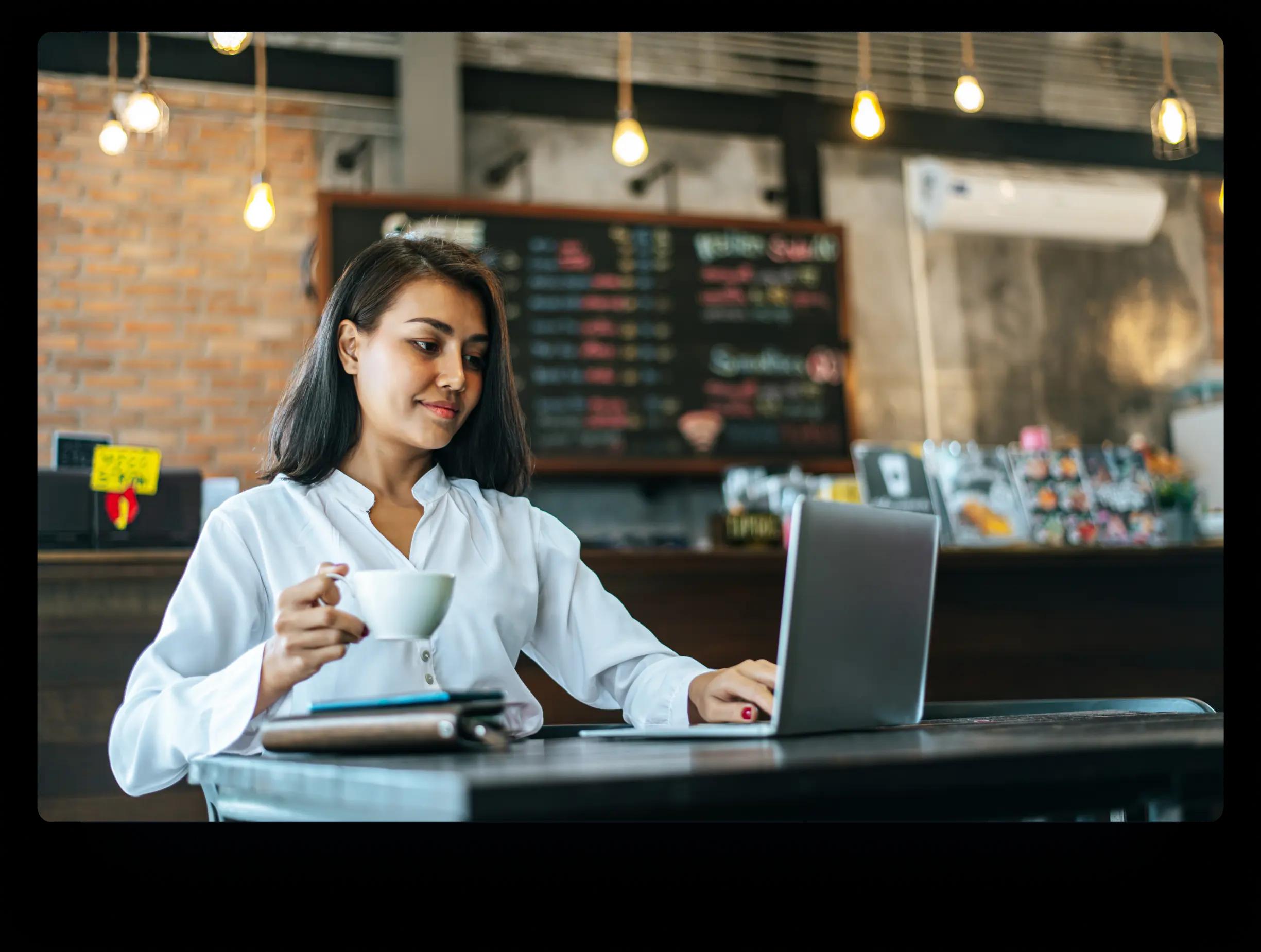 a woman drinking coffee